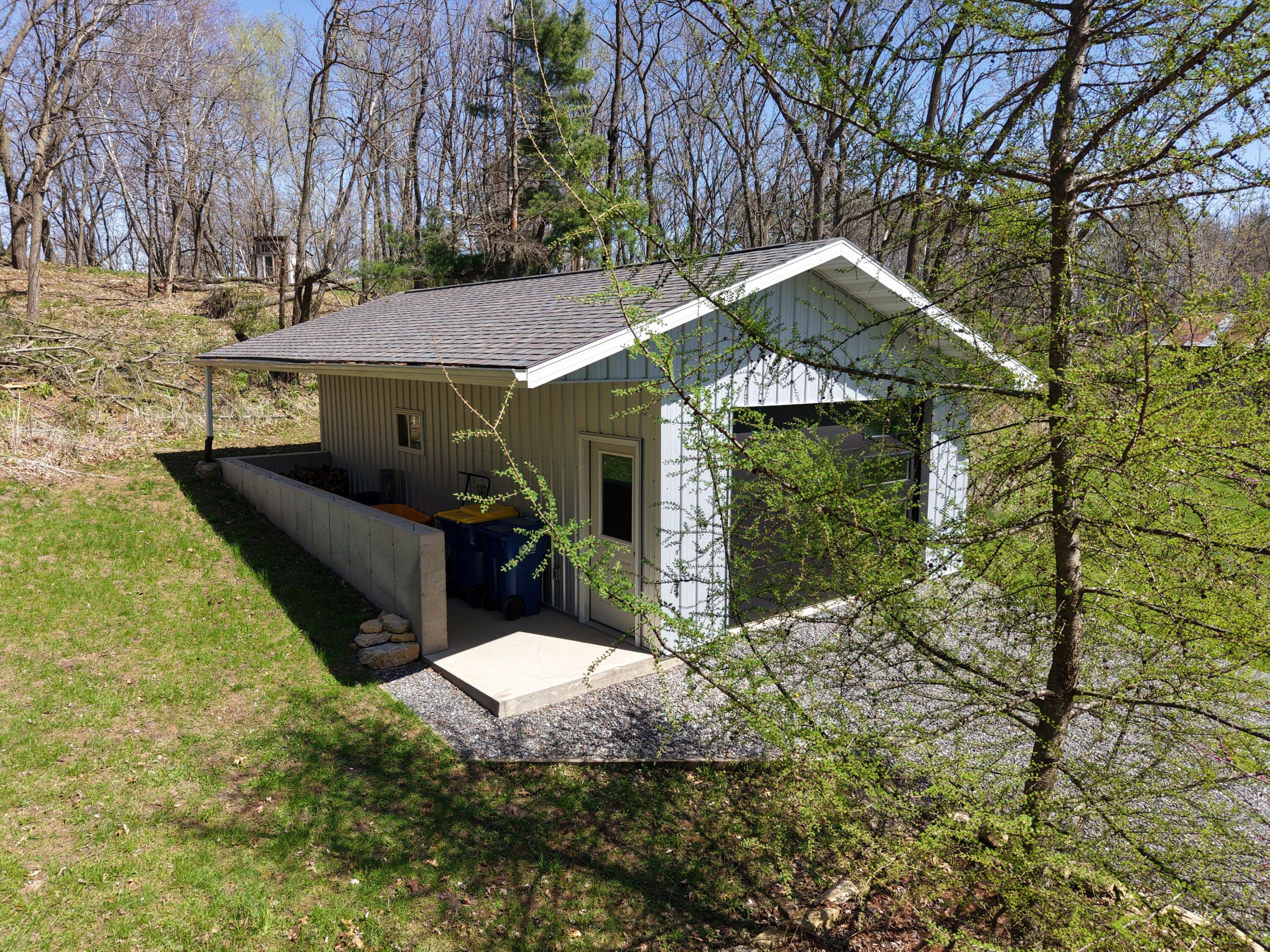 924 Defreese Street Viroqua, WI 54665 - Photo 32 of 47 Outdoor Storage w/ Overhang