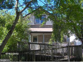 25 Ridge Avenue Mount Holly, NJ 08060 - Photo 2 of 11 a front view of a house with a garden