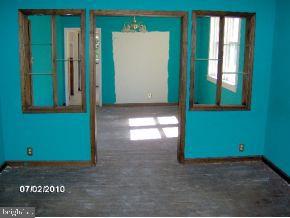 25 Ridge Avenue Mount Holly, NJ 08060 - Photo 6 of 11 an empty room with windows