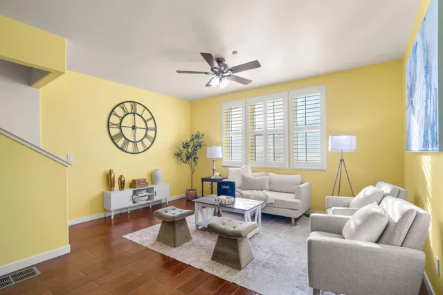a view of a livingroom with furniture and entryway