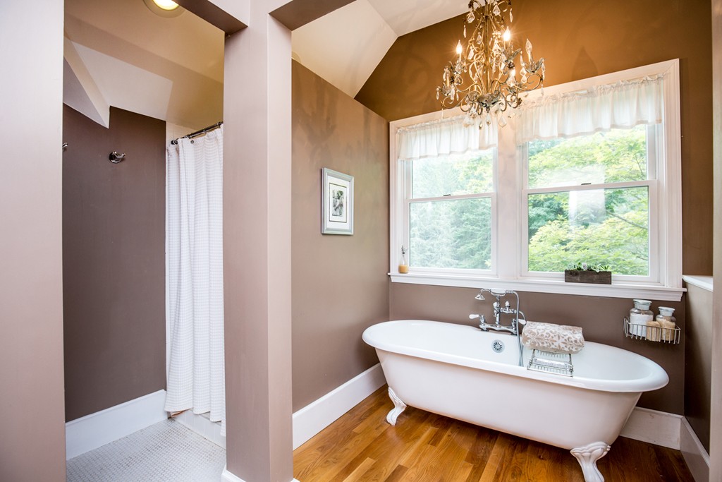 127 Haverhill Road Topsfield, MA 01983 - Photo 20 of 28 a spacious bathroom with a sink and a large mirror