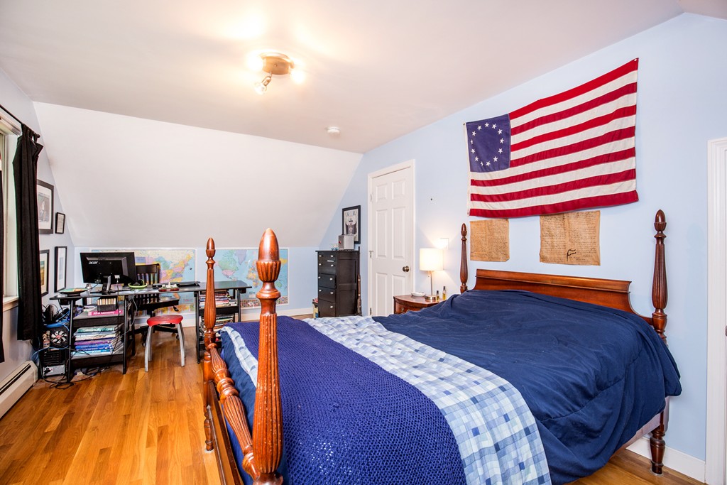 127 Haverhill Road Topsfield, MA 01983 - Photo 21 of 28 a bedroom with a bed and a tv