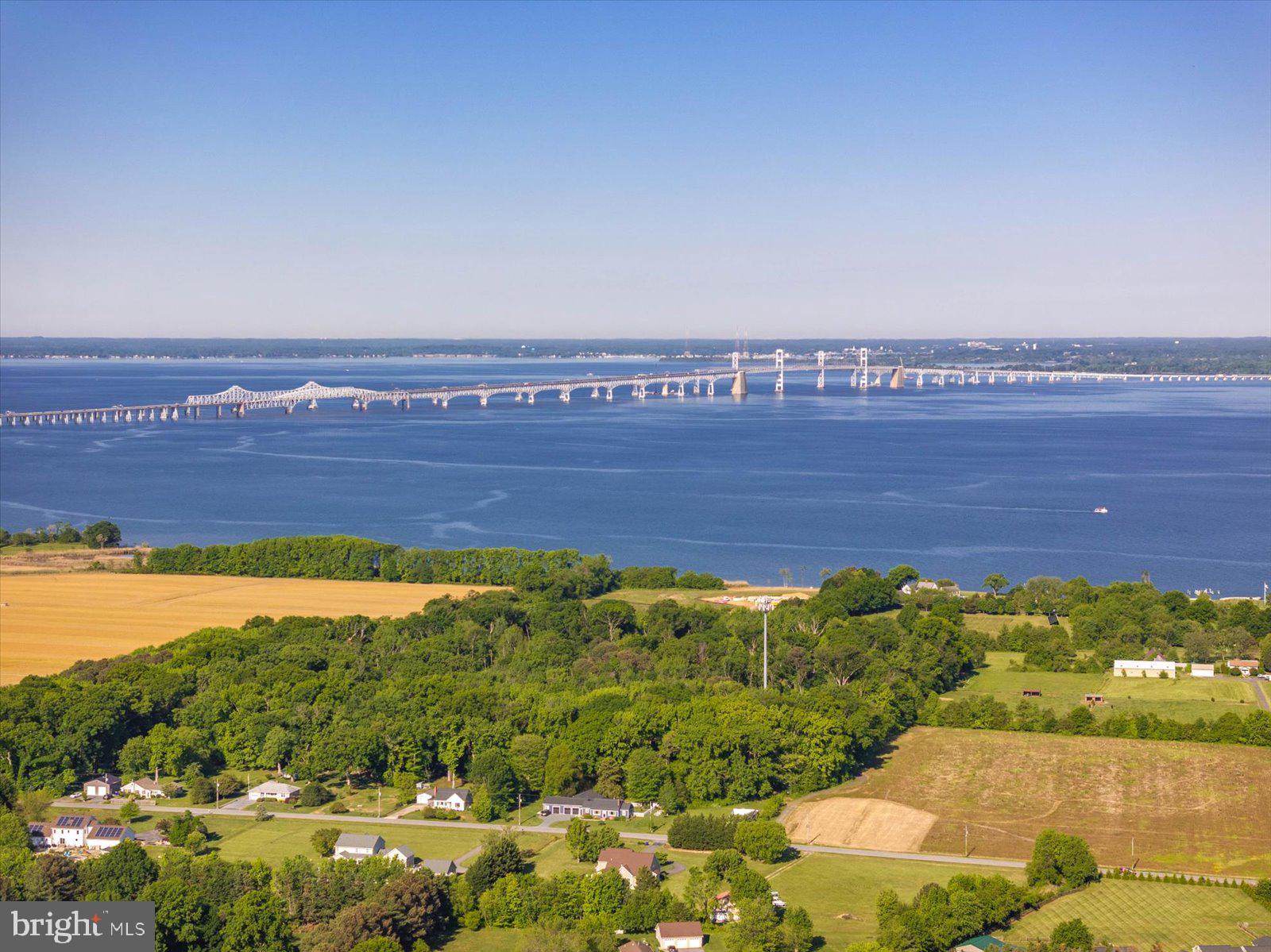 1130 Old Love Point Road Stevensville, MD 21666 - Photo 22 of 26 a view of an ocean and beach