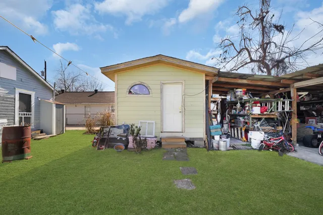 a view of a chairs and a table in a room