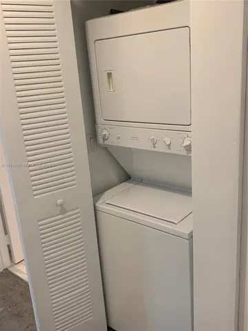 a view of a swimming pool with a lounge chairs