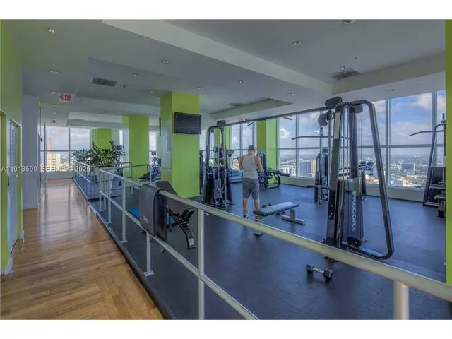 a lobby with furniture and window