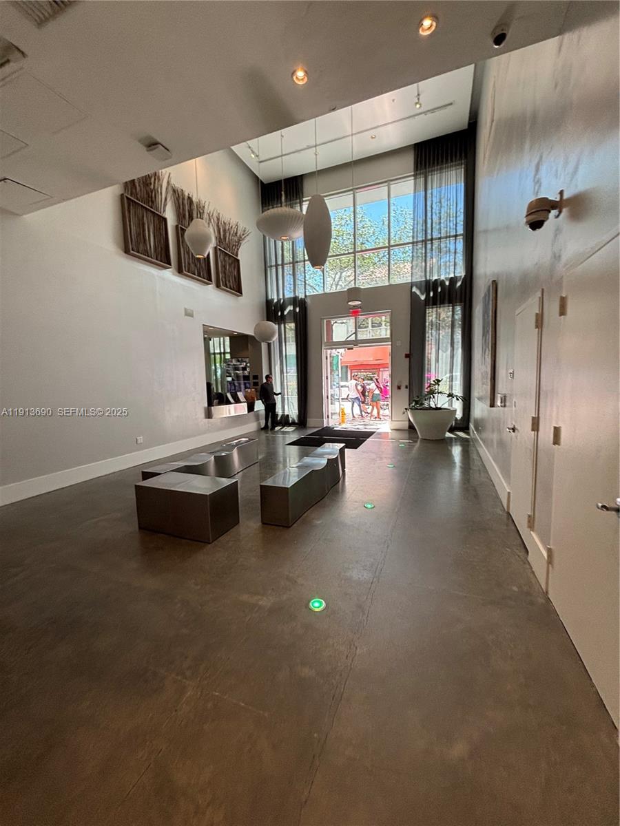 133 Northeast 2nd Avenue, Unit 1519 Miami, FL 33132 - Photo 38 of 41 a lobby with furniture and window