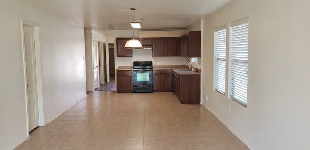 a view of a kitchen with a sink