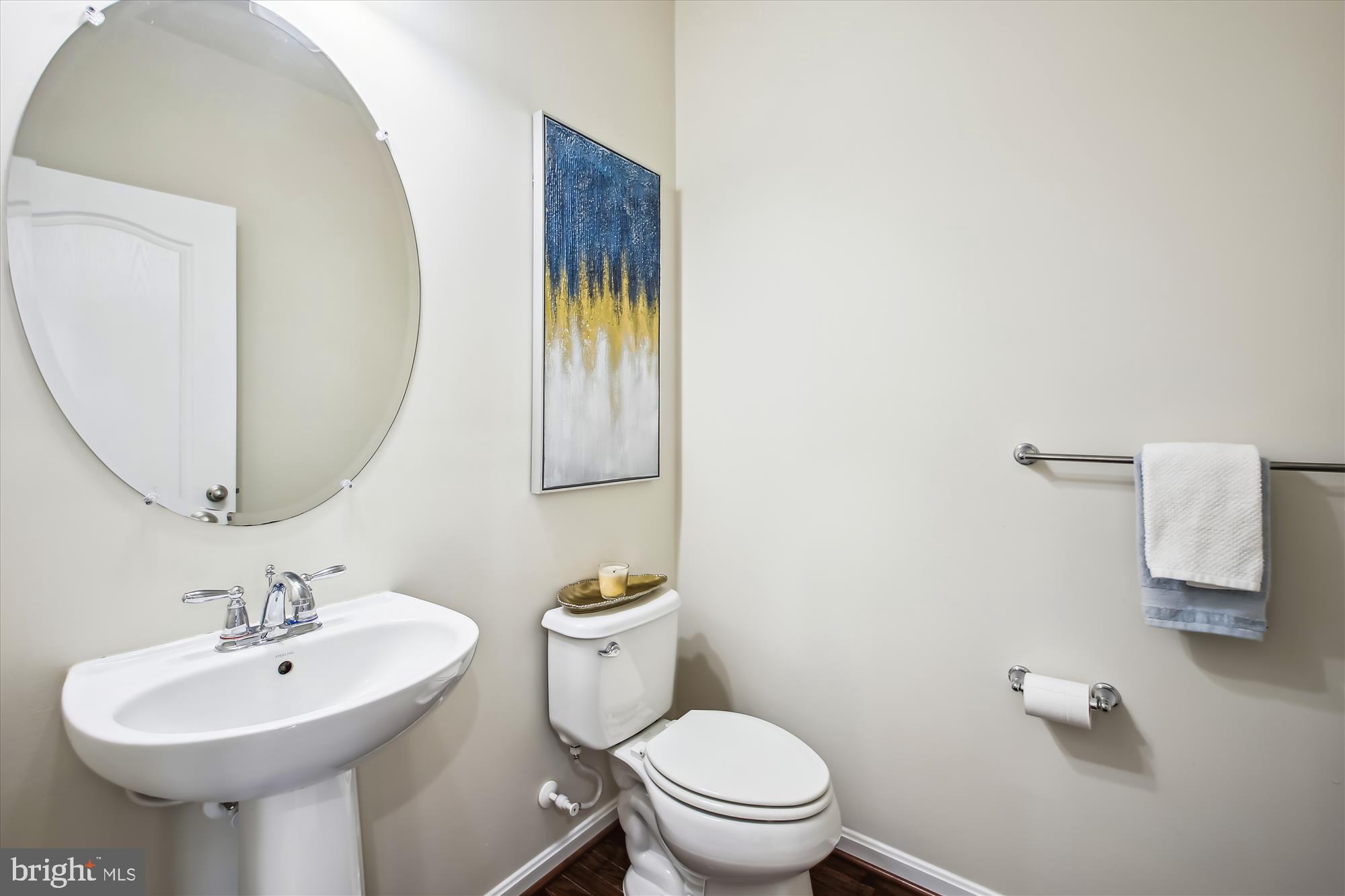7941 Silver Oak Road Hanover, MD 21076 - Photo 17 of 56 MAIN LVL POWDER ROOM W/ PEDESTAL SINK & H/W FLOORS