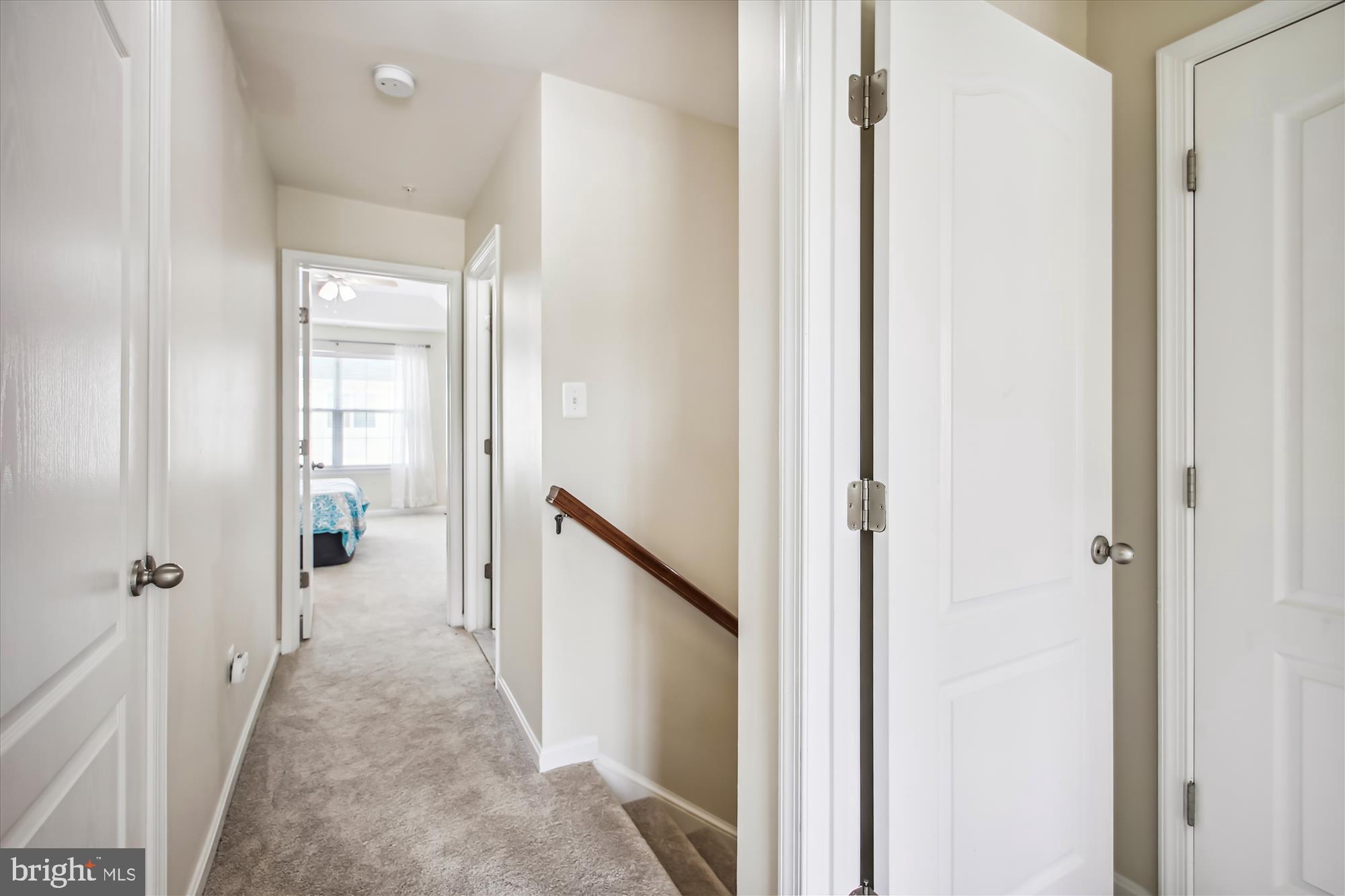 7941 Silver Oak Road Hanover, MD 21076 - Photo 19 of 56 WELL-LIT CARPETED HALLWAY
