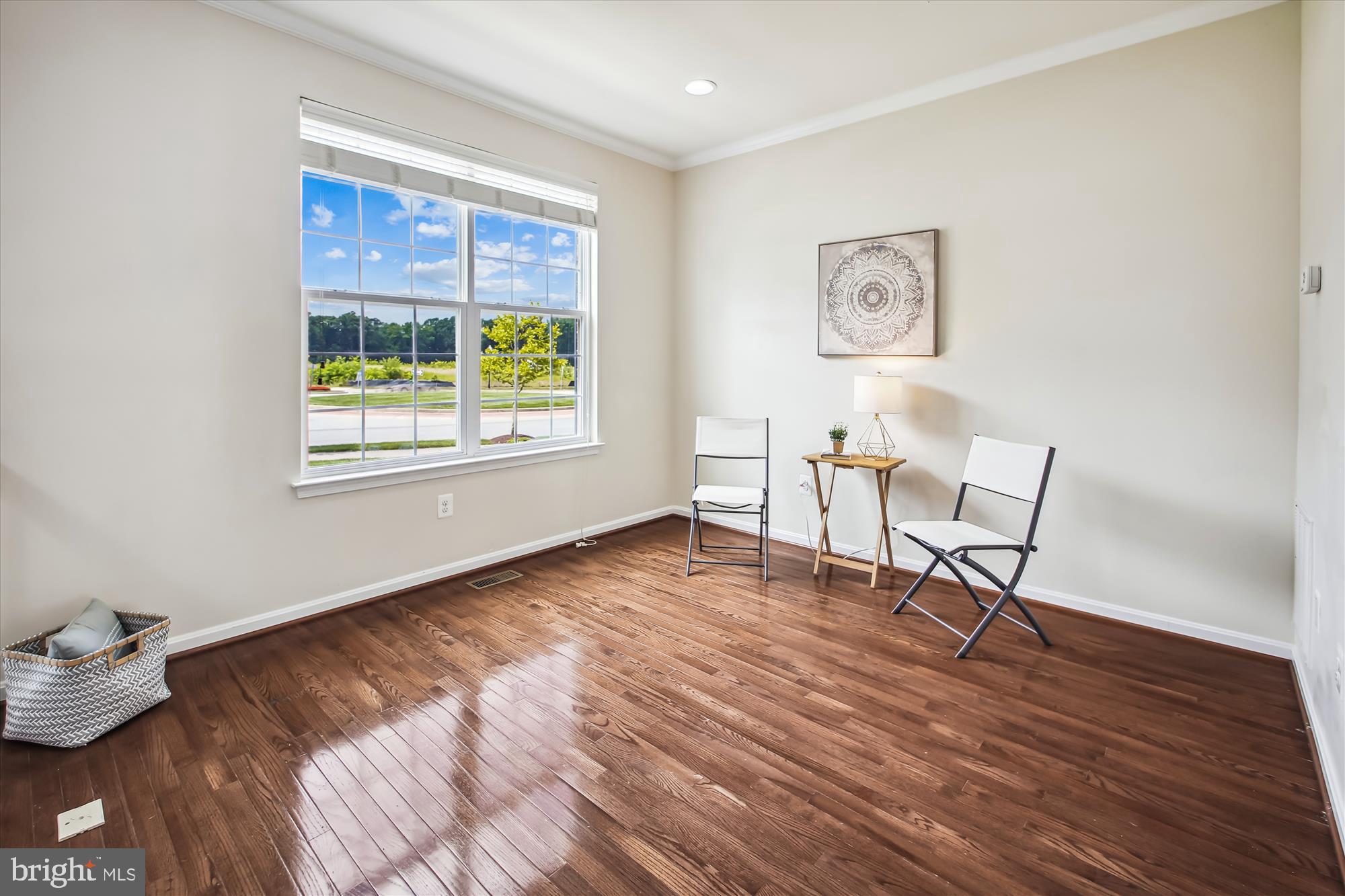 7941 Silver Oak Road Hanover, MD 21076 - Photo 5 of 56 LIGHT-FILLED LIVING ROOM W/ CROWN MOLDING