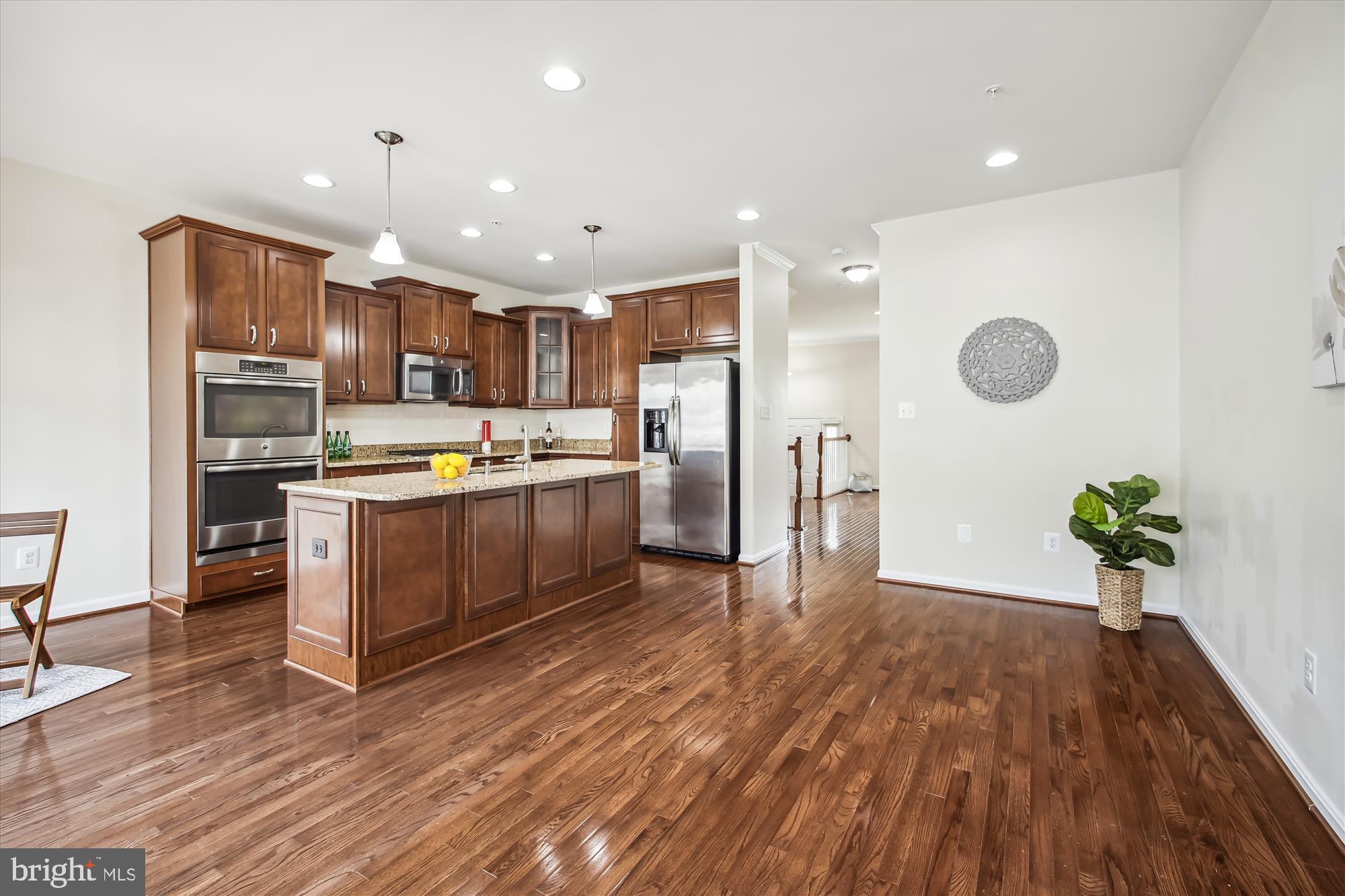 7941 Silver Oak Road Hanover, MD 21076 - Photo 8 of 56 RECESSED LIGHTING IN FAMILY ROOM & KITCHEN
