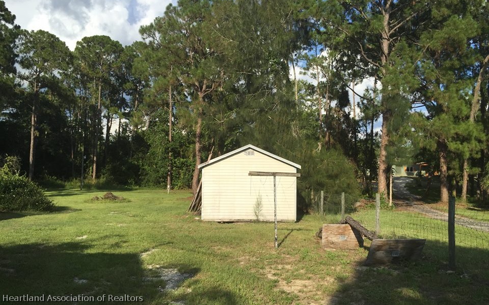 303 Mini Road Sebring, FL 33870 - Photo 9 of 15 BACK YARD