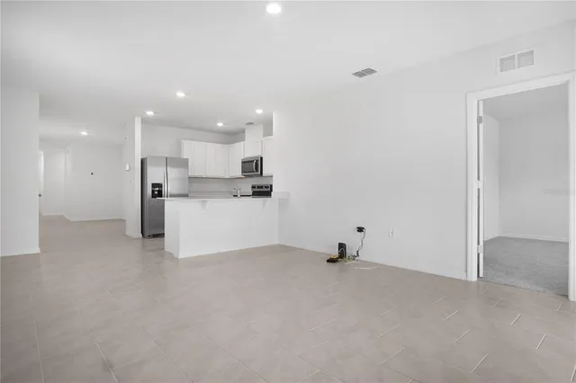 a view of a kitchen with a sink