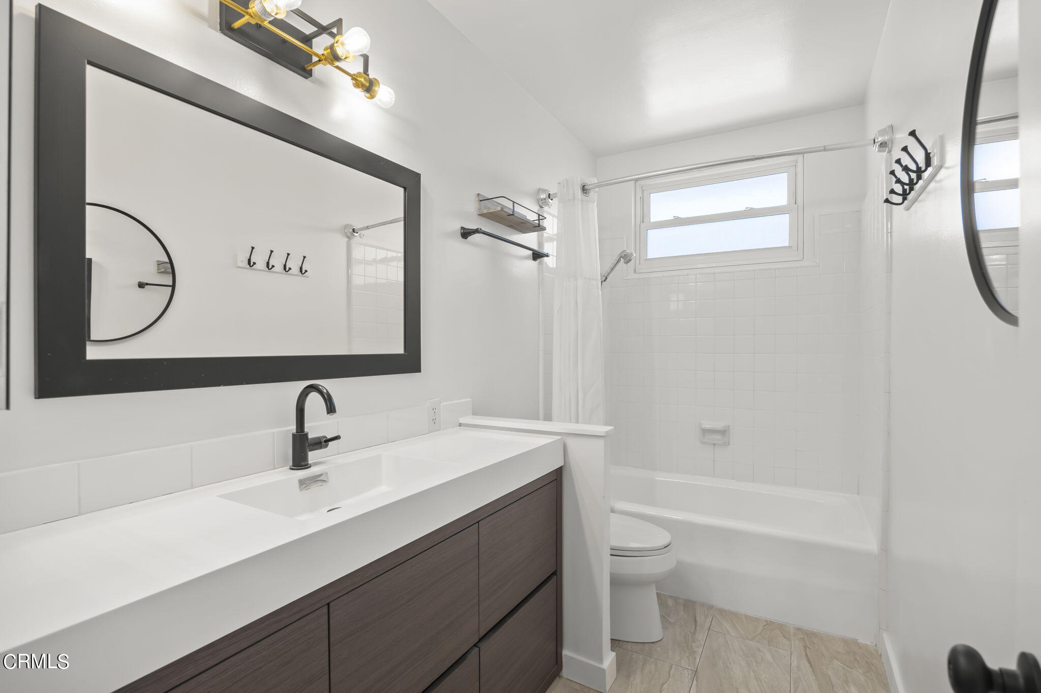 237 Brucker Road West Oxnard, CA 93033 - Photo 20 of 29 a bathroom with a sink a toilet and a mirror