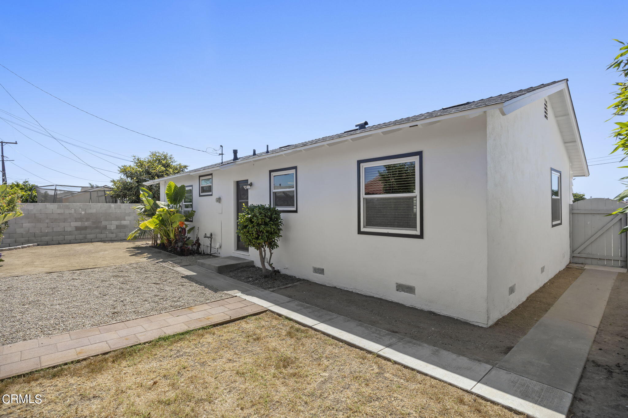 237 Brucker Road West Oxnard, CA 93033 - Photo 25 of 29 a view of a house with a backyard
