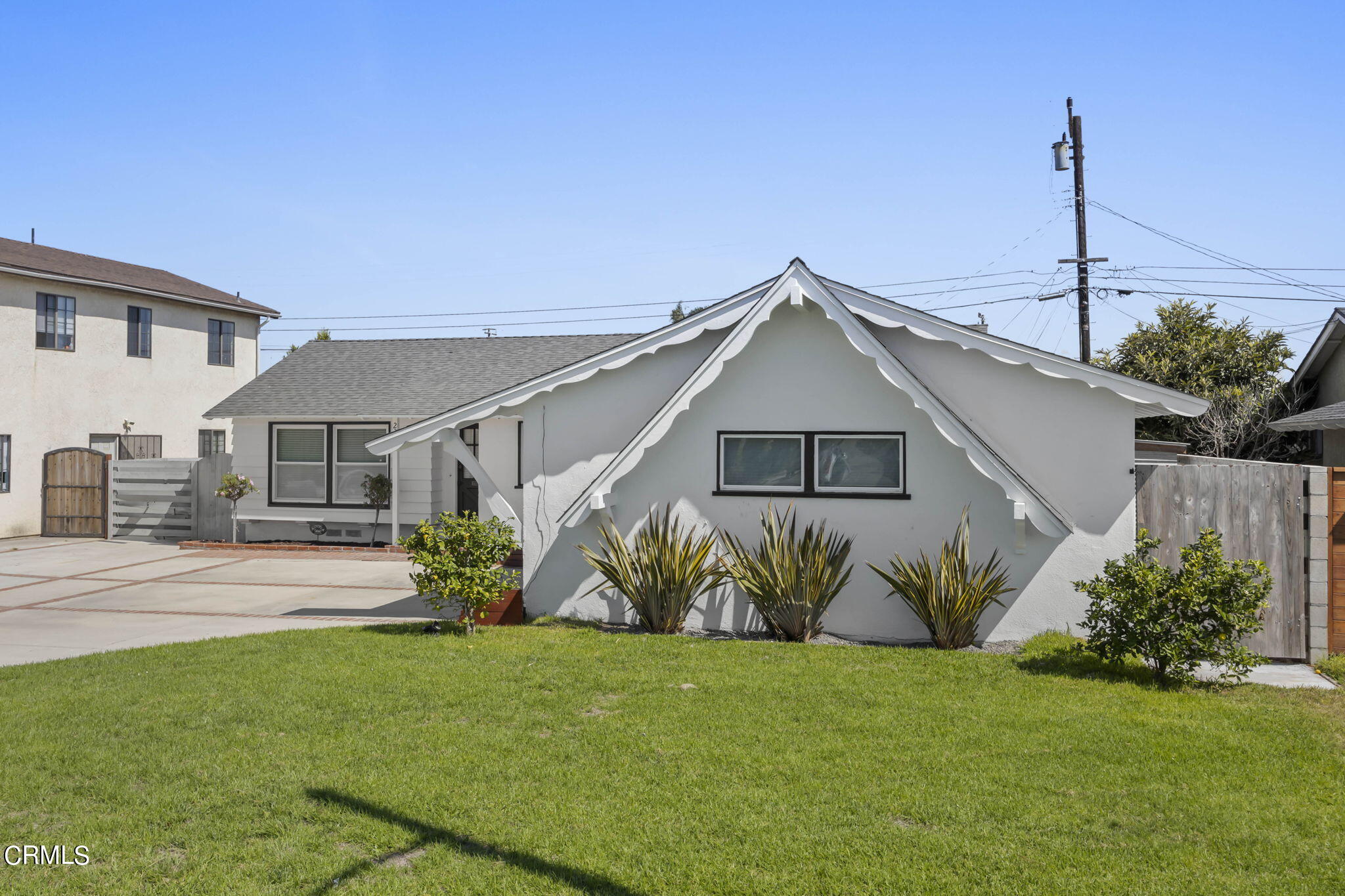 237 Brucker Road West Oxnard, CA 93033 - Photo 3 of 29 a view of a house with a yard