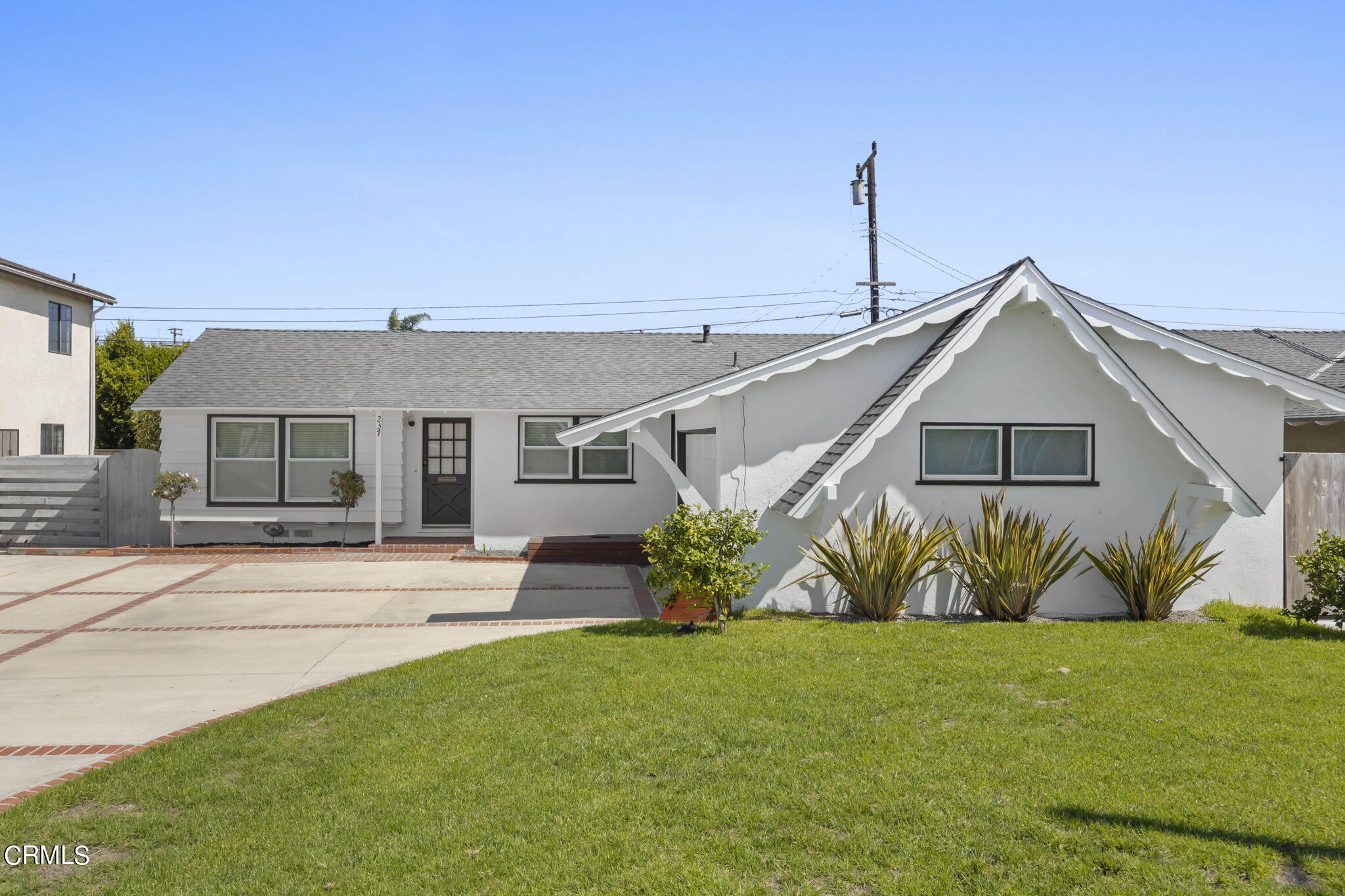 237 Brucker Road West Oxnard, CA 93033 - Photo 4 of 29 a view of a house with a yard