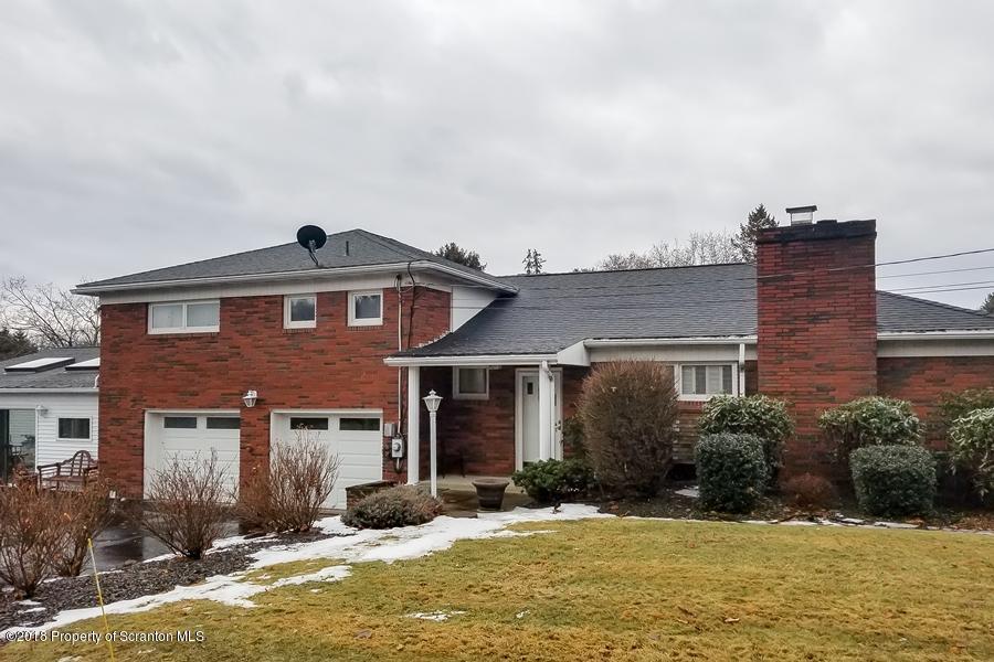 361 Upper Demunds Road Dallas, PA 18612 - Photo 1 of 27 a front view of a house with a yard
