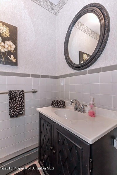 361 Upper Demunds Road Dallas, PA 18612 - Photo 14 of 27 a bathroom with a sink and a mirror