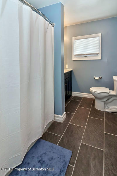 361 Upper Demunds Road Dallas, PA 18612 - Photo 17 of 27 a bathroom with a toilet and a sink