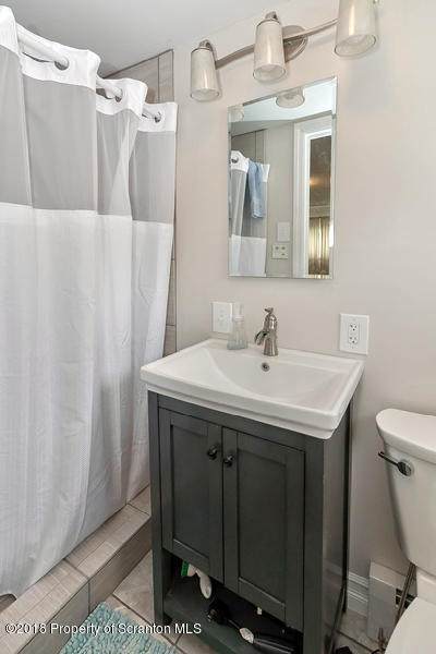 361 Upper Demunds Road Dallas, PA 18612 - Photo 21 of 27 a bathroom with a sink and mirror
