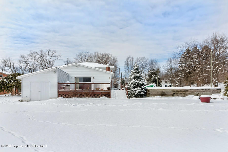 361 Upper Demunds Road Dallas, PA 18612 - Photo 26 of 27 a view of a house with a snow in front of yard