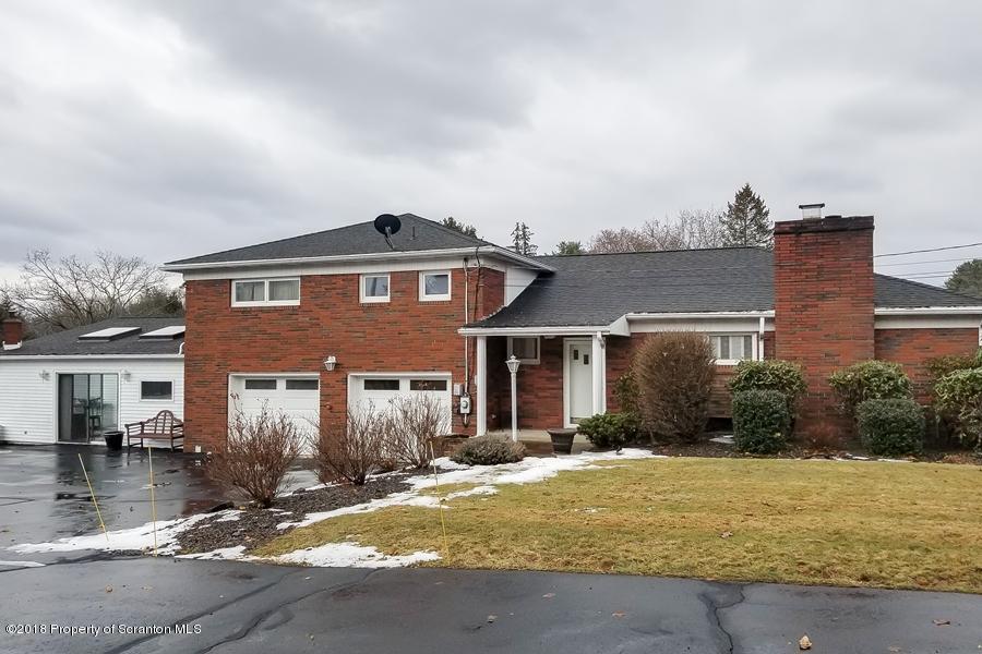 361 Upper Demunds Road Dallas, PA 18612 - Photo 27 of 27 a front view of a house with a yard