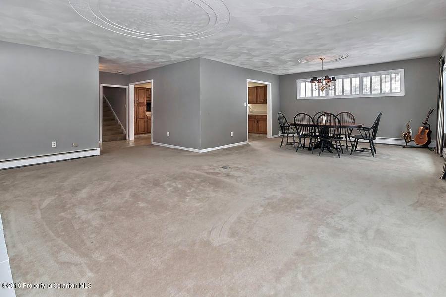 361 Upper Demunds Road Dallas, PA 18612 - Photo 5 of 27 a view of a livingroom with furniture and a window