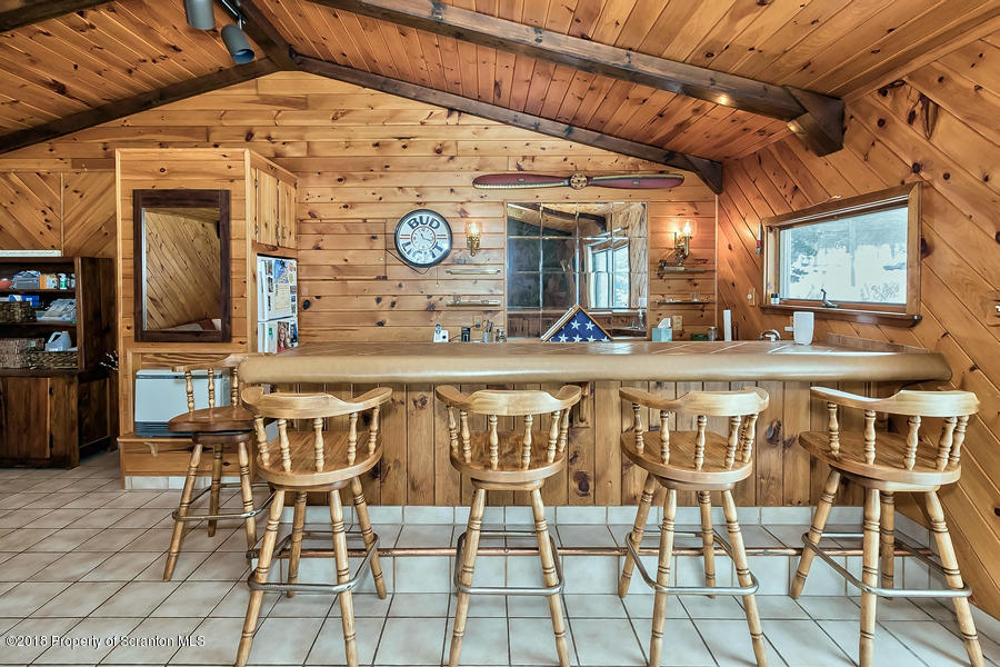 361 Upper Demunds Road Dallas, PA 18612 - Photo 10 of 27 a dinning table and chairs in a room