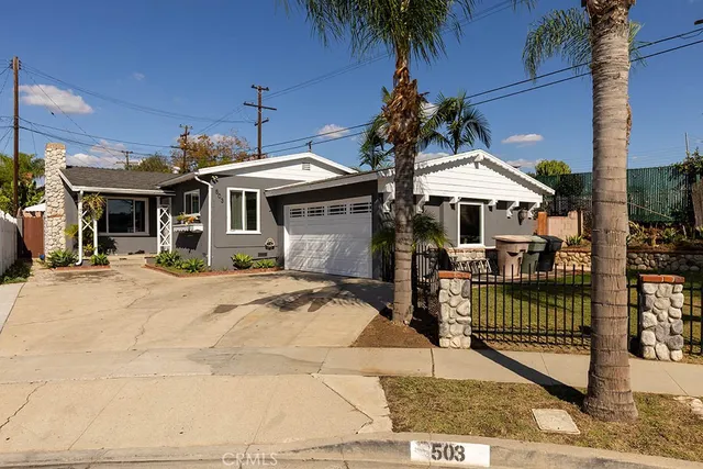 a front view of a house with a porch
