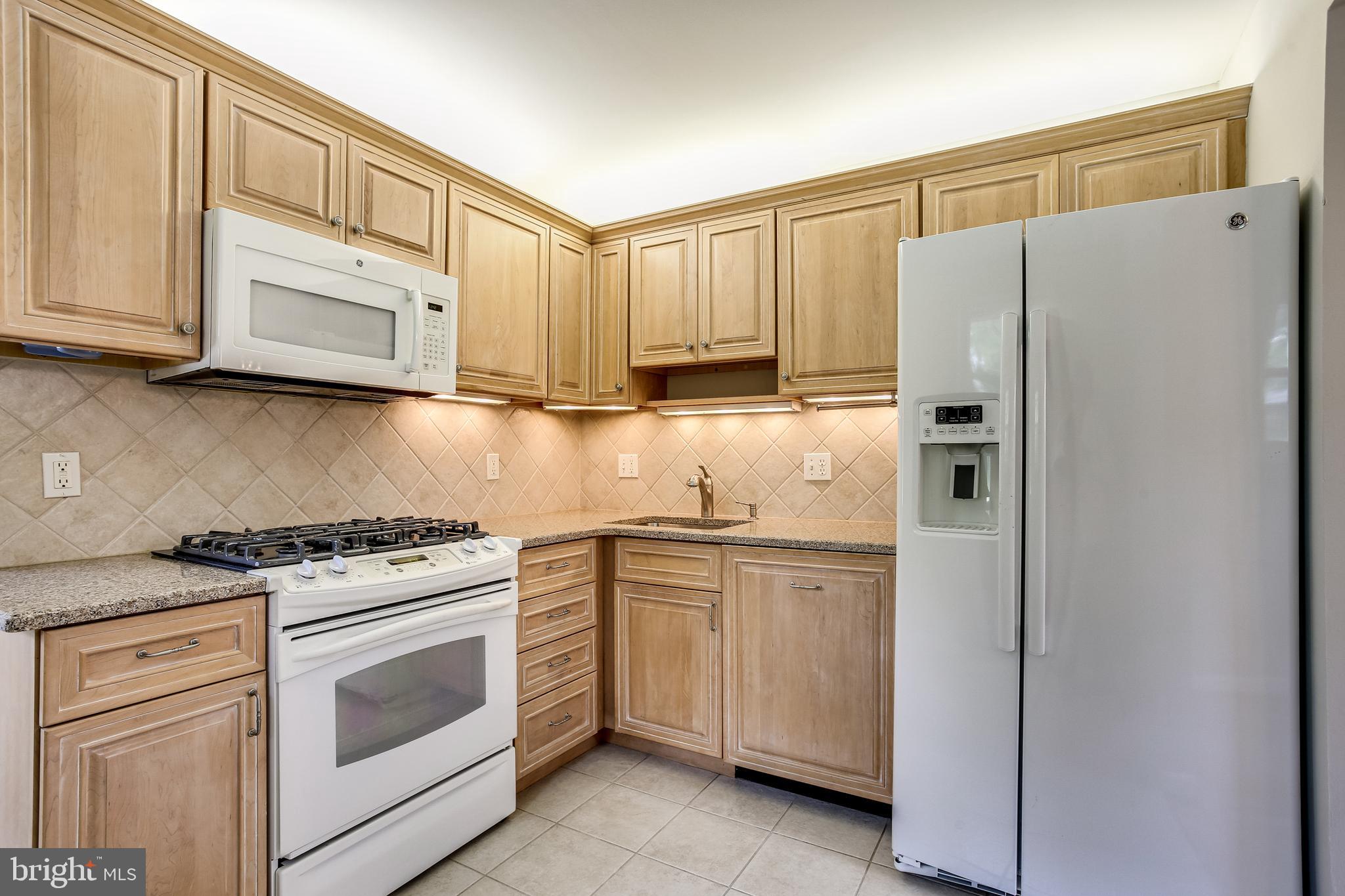 10914 Lombardy Road Silver Spring, MD 20901 - Photo 7 of 34 Beautiful kitchen w/ backsplash & granite counters