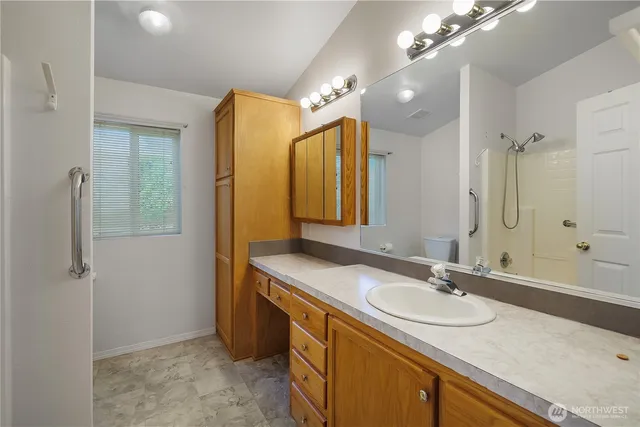 a view of hallway with washer and dryer