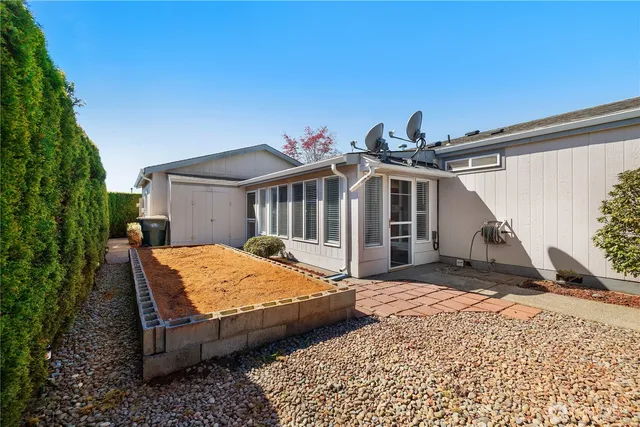 a view of a balcony with wooden fence