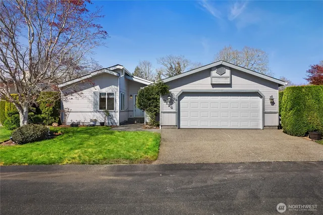 front view of a house with a fountain