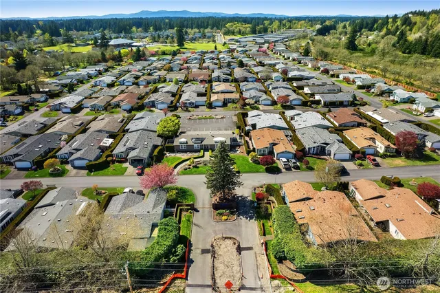 an aerial view of a houses with outdoor space