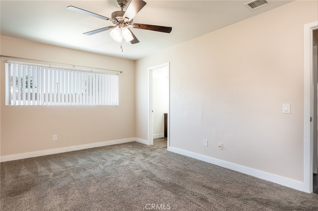 41134 Vía Halcon Temecula, CA 92591 - Photo 12 of 28 an empty room with a window and a fan