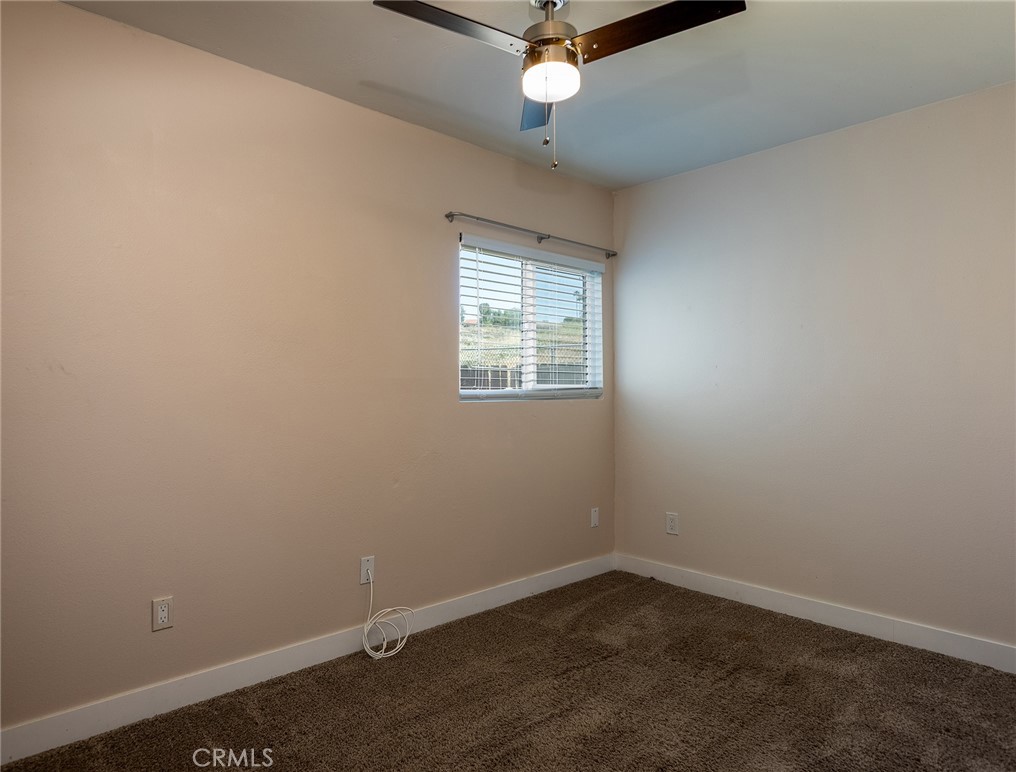 41134 Vía Halcon Temecula, CA 92591 - Photo 14 of 28 an empty room with a window and a fan