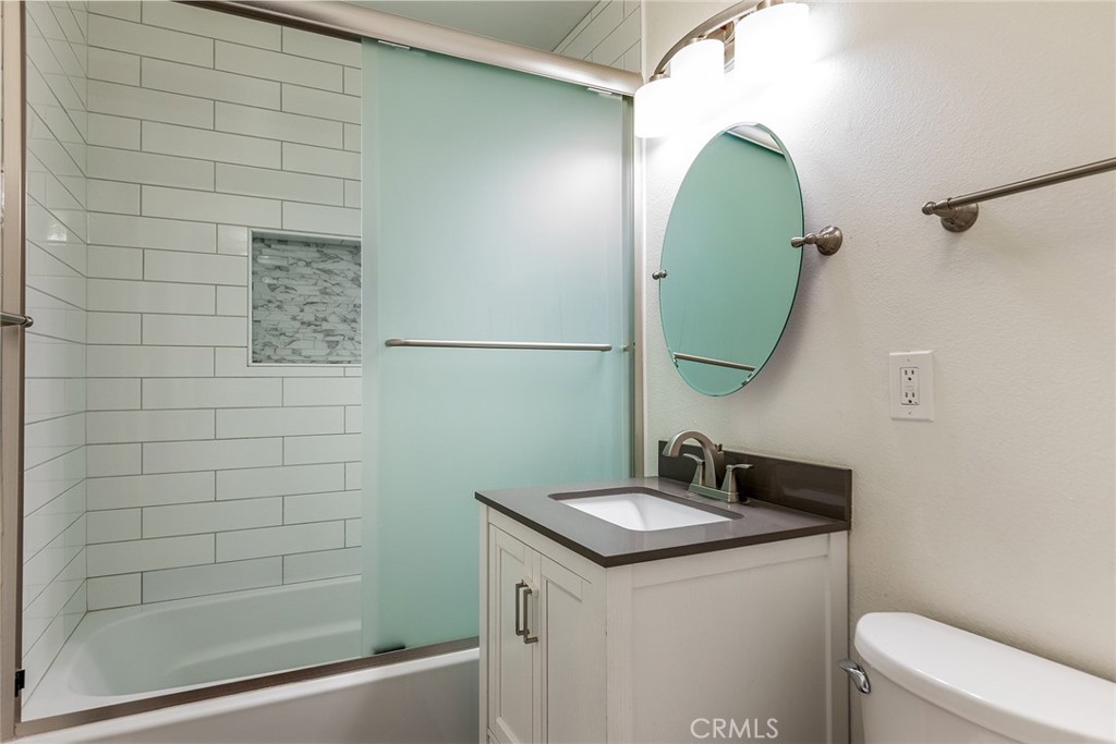 41134 Vía Halcon Temecula, CA 92591 - Photo 15 of 28 a bathroom with a sink and mirror