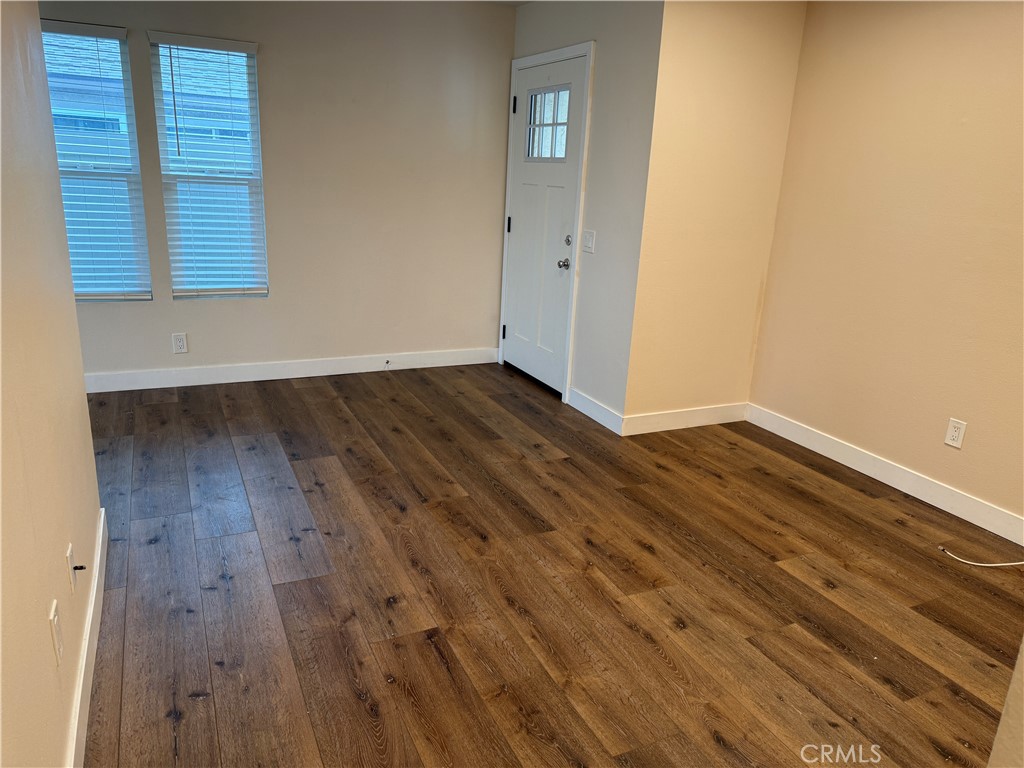 41134 Vía Halcon Temecula, CA 92591 - Photo 19 of 28 a view of an empty room with wooden floor and a window