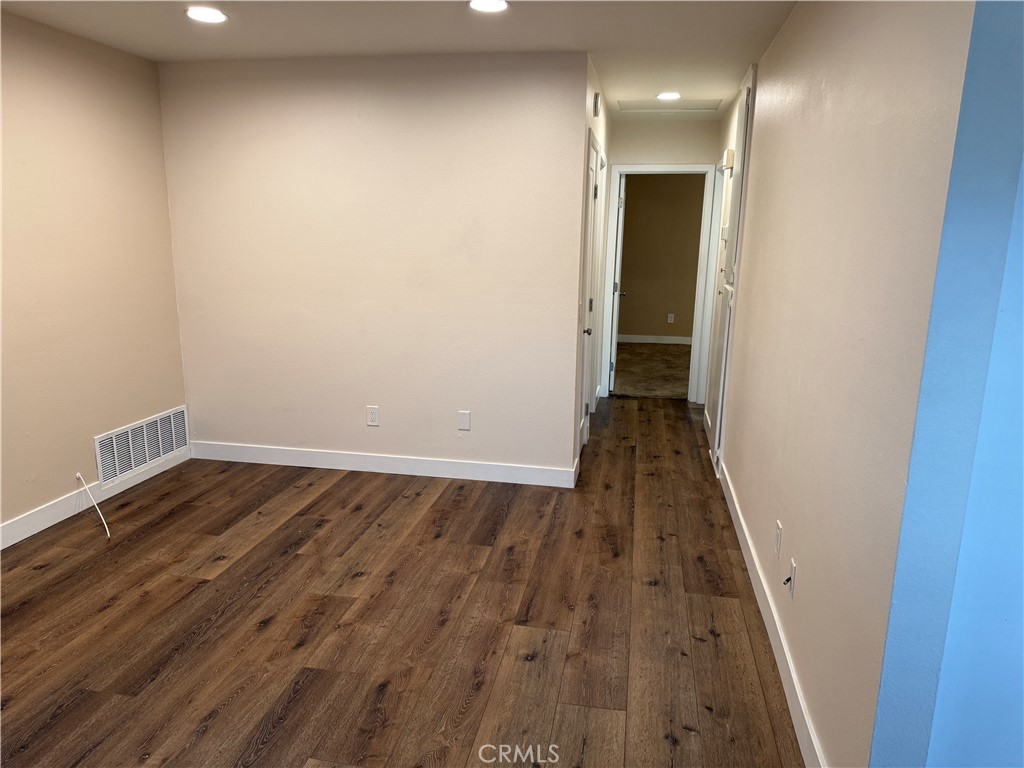 41134 Vía Halcon Temecula, CA 92591 - Photo 21 of 28 a view of a hallway with wooden floor