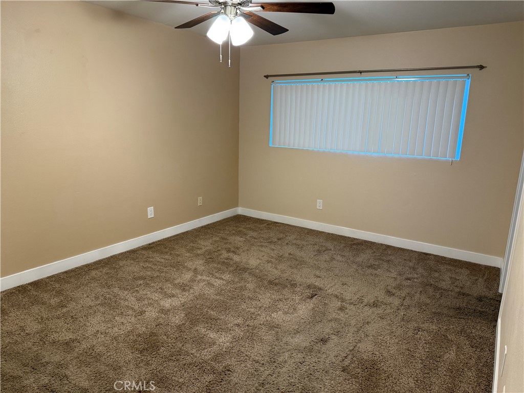 41134 Vía Halcon Temecula, CA 92591 - Photo 25 of 28 an empty room with a chandelier fan