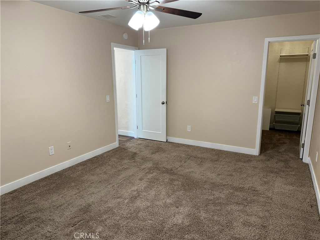 41134 Vía Halcon Temecula, CA 92591 - Photo 26 of 28 an empty room with a chandelier fan