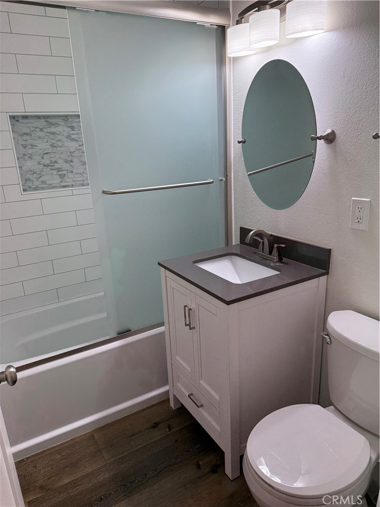 41134 Vía Halcon Temecula, CA 92591 - Photo 27 of 28 a bathroom with a toilet a sink and mirror