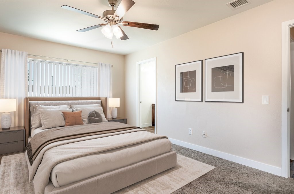 41134 Vía Halcon Temecula, CA 92591 - Photo 3 of 28 a bedroom with a large bed and a chandelier