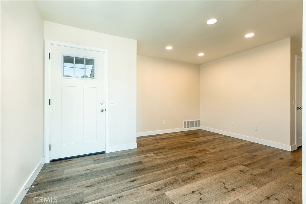41134 Vía Halcon Temecula, CA 92591 - Photo 7 of 28 an empty room with wooden floor and windows