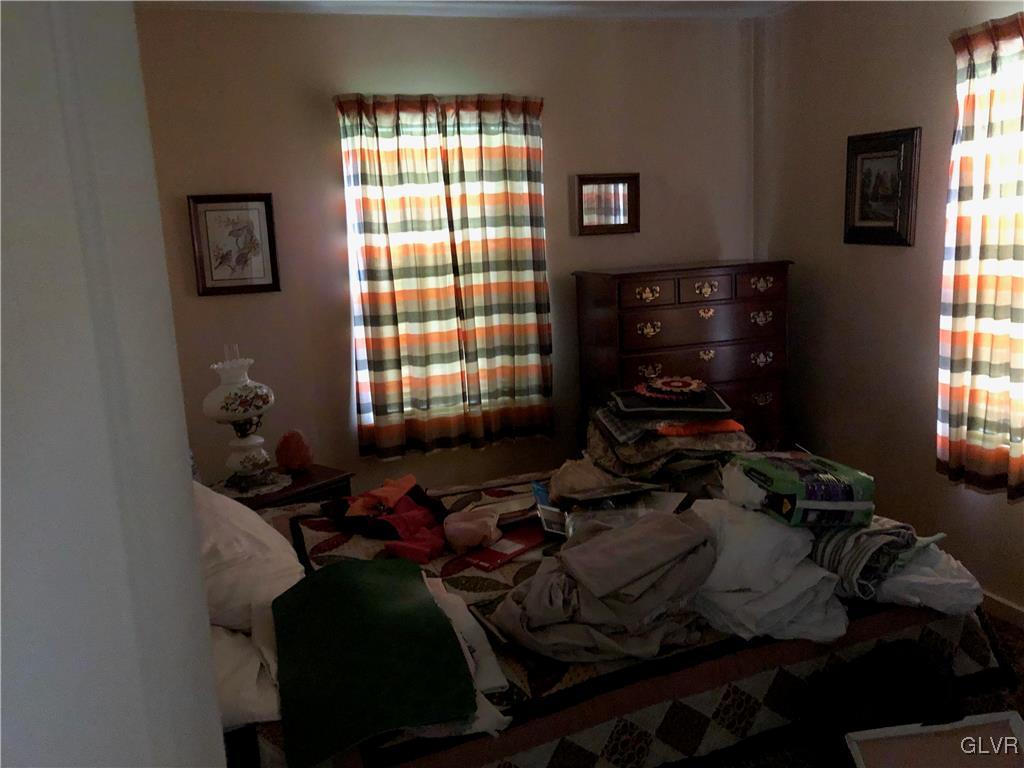 3733 Huckleberry Road Allentown, PA 18104 - Photo 6 of 15 a room with furniture closet and window