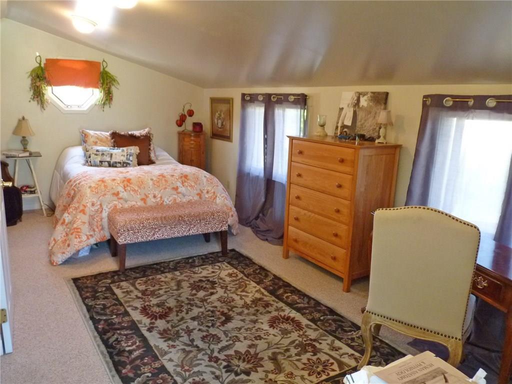 187 Ellsworth Road Blue Hill, ME 04614 - Photo 17 of 29 Second floor bedroom with built-ins