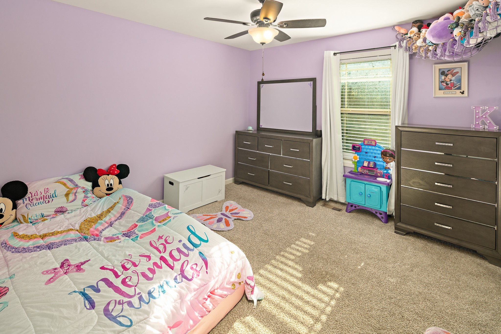 1550 South Spring Street Manchester, TN 37355 - Photo 17 of 26 a bedroom with a bed and a dresser