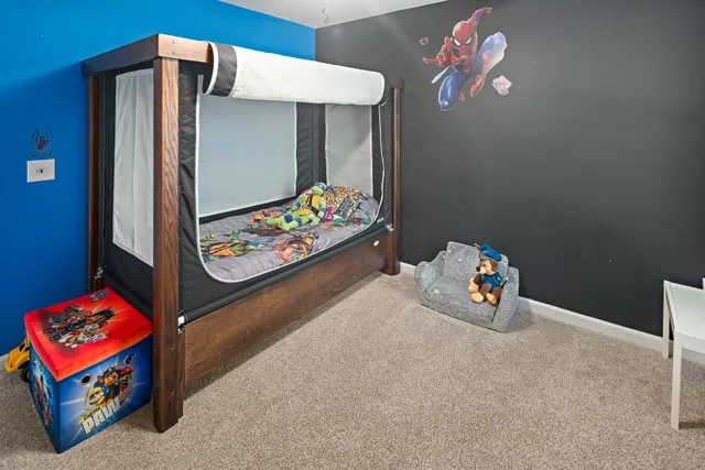 a room with toys and a chandelier